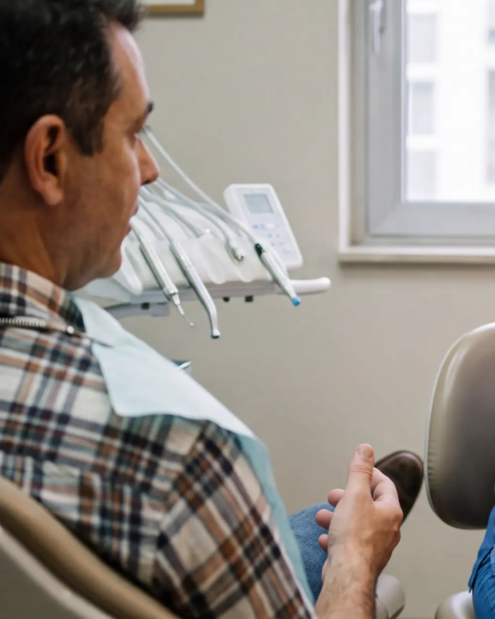 Paciente na cadeira odontológica